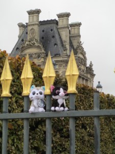 Minions on fence by the Louvre